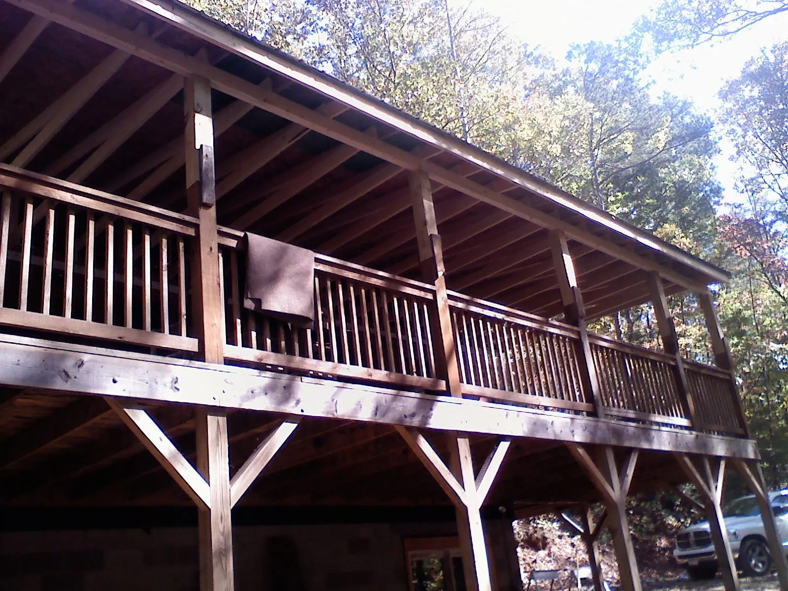 Timber framing under a new elevated porch and deck — Roof Leak Repair in Lemon Springs by Roofing Brothers